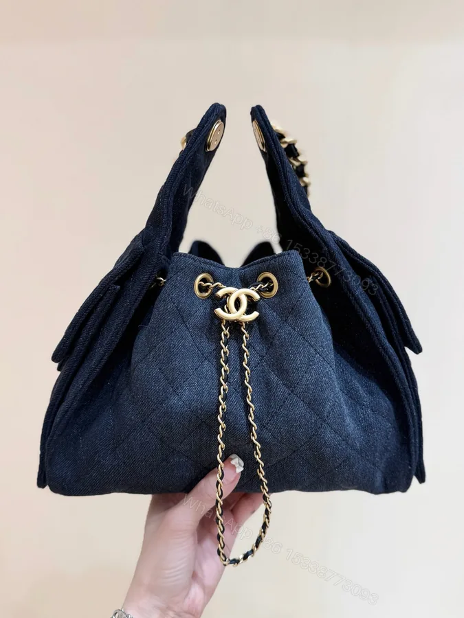 View 1 of CHANEL 25 HANDBAG 30 IN DARK BLUE DENIM GOLD HARDWARE