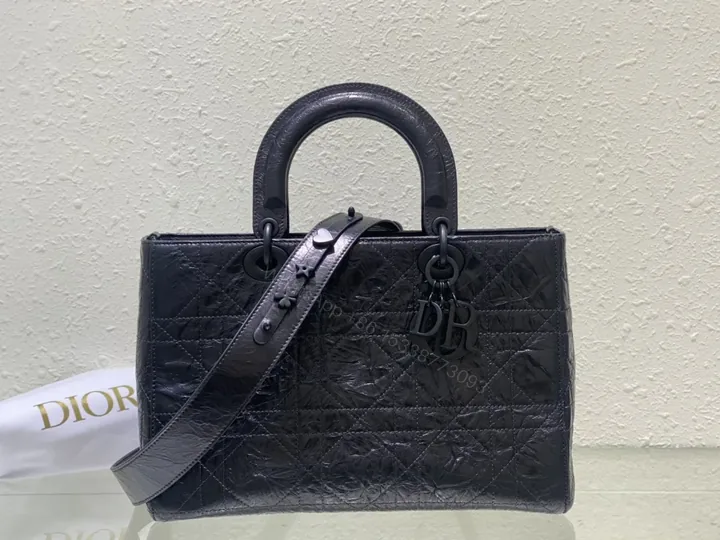 View 1 of Quilted Patent Handbag: Black, Top Handle, Crossbody, Luxe