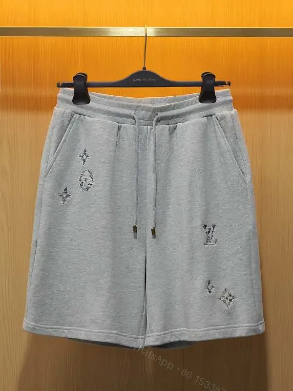 View 1 of Grey Cotton Shorts Louis Vuitton Motifs Casual Embroidered Logo Sweatshorts