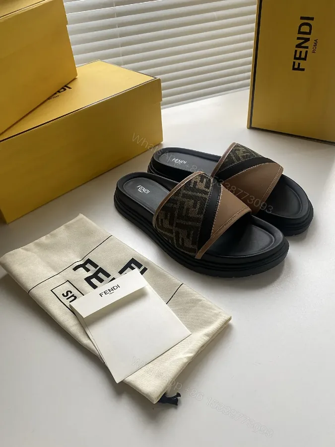 View 1 of Monogram Canvas Slide Sandals: Modern Comfort & Luxe Detailing
