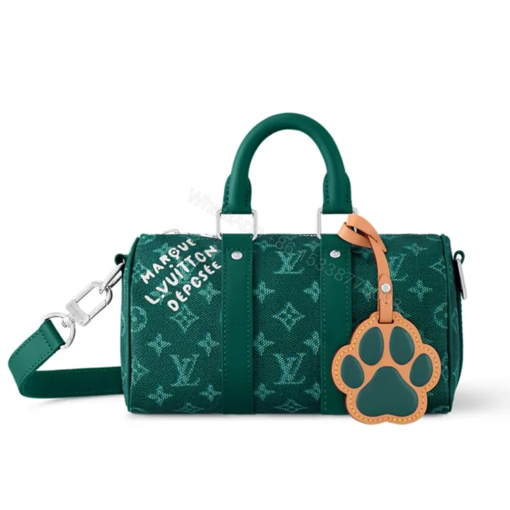 View 1 of Louis Vuitton Keepall Bandoulière 25 Monogram Green 25Cm
