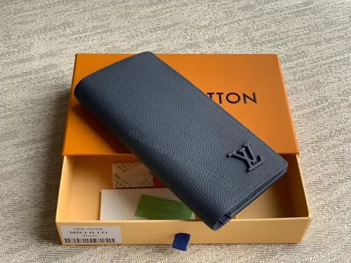 View 1 of Navy Pebbled Calfskin Long Wallet â€“ Subtle LV Luxe