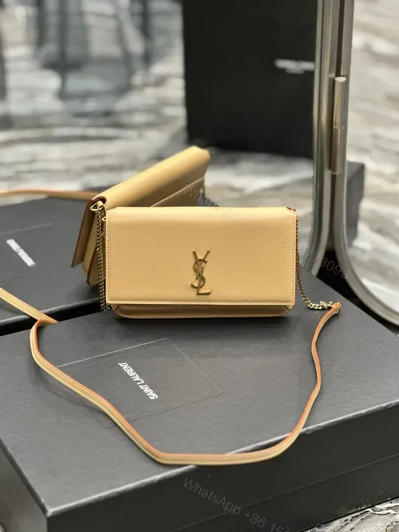View 1 of Chic Beige Leather Crossbody with Gold Emblem