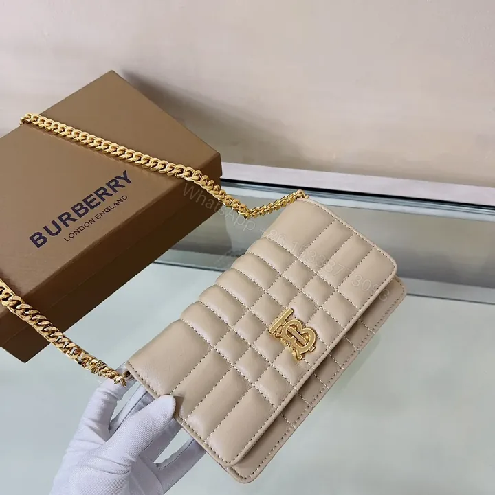 View 1 of Quilted Crossbody with Gold Chain – Beige Luxury Bag