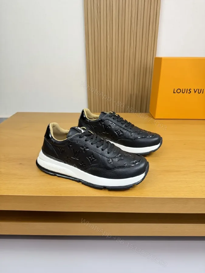 View 1 of Black Leather Trainer with Subtle Monogram Detailing - Everyday Luxe Comfort
