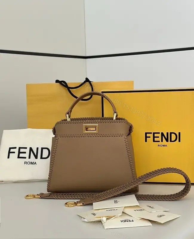 View 1 of Taupe-Tone Leather Crossbody: Braided Edge, Turn-Lock Bag