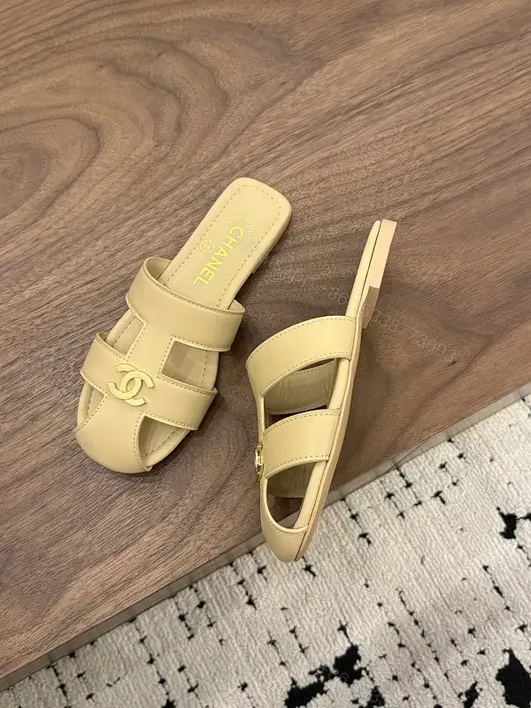 View 1 of Beige Leather Slide Sandals with Chanel Logo, Flat Heel