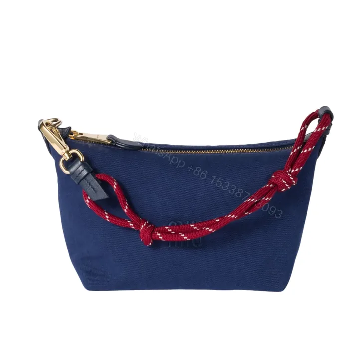 View 1 of MIUMIU GABARDINE POUCH INDIGO AND AMARANTH 18CM 5NE841 2IA7 F04GM