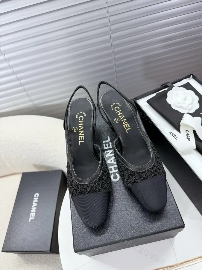 View 1 of Chic Black Mesh Slingback: Textured Luxury Slip-Ons