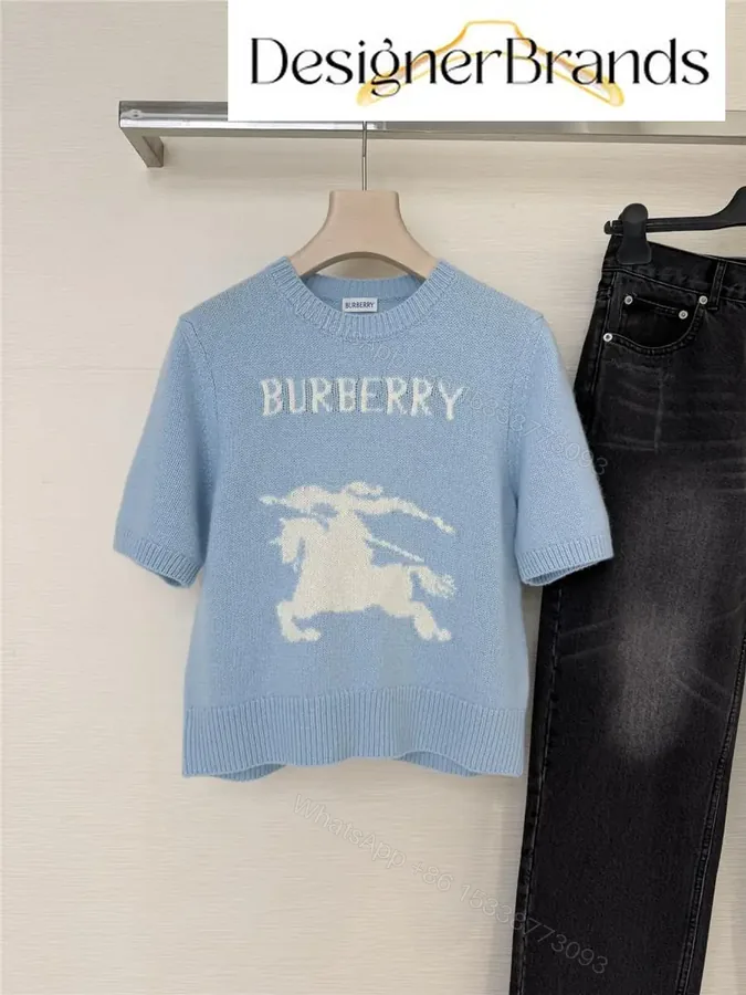 View 1 of Soft blue knit sweater, logo pony, cropped fit, premium casual style