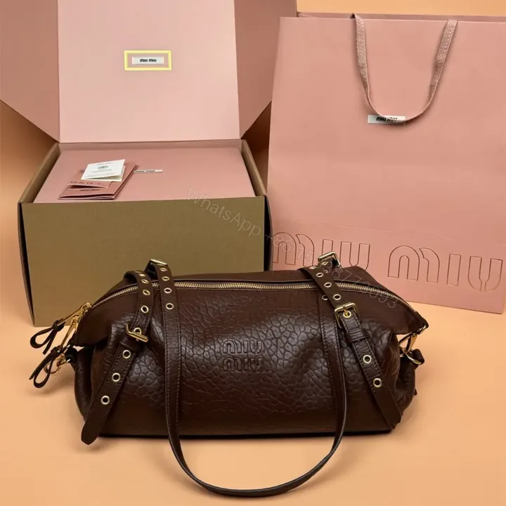 View 1 of 高仿miumiu*5BC190小羊皮壓花單肩包棕色免檢版