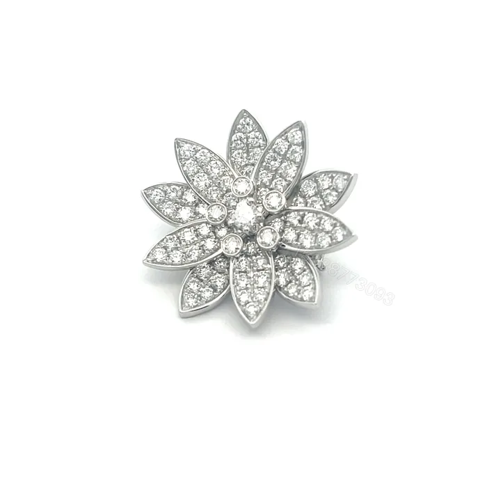 View 1 of Van Cleef & Arpels Lotus White Gold Clip Pendant & Brooches