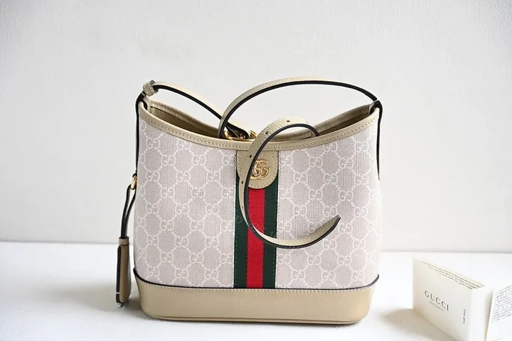 View 1 of Beige Canvas + Leather Tote: Structured Signature Everyday Luxury