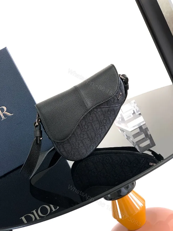 View 1 of Charcoal Calfskin Crossbody: Subtle Luxe, Compact Utility