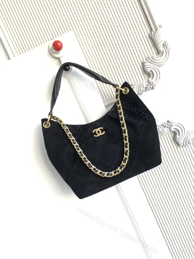 View 1 of Chic Black Quilted Bag with Gold Chain: Everyday Luxury