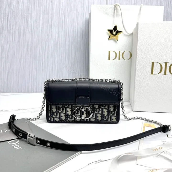 View 1 of Chic Monogram Leather Trim Structured Bag - Compact Luxury