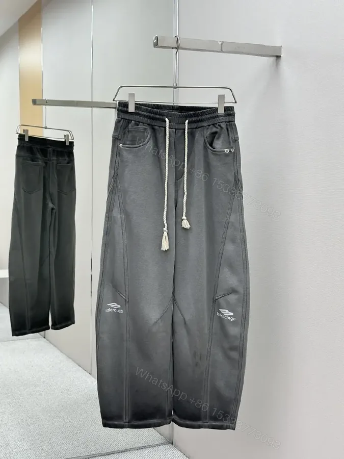 View 1 of Relaxed Tech-Fleece Joggers w/ Signature Logo Chinos
