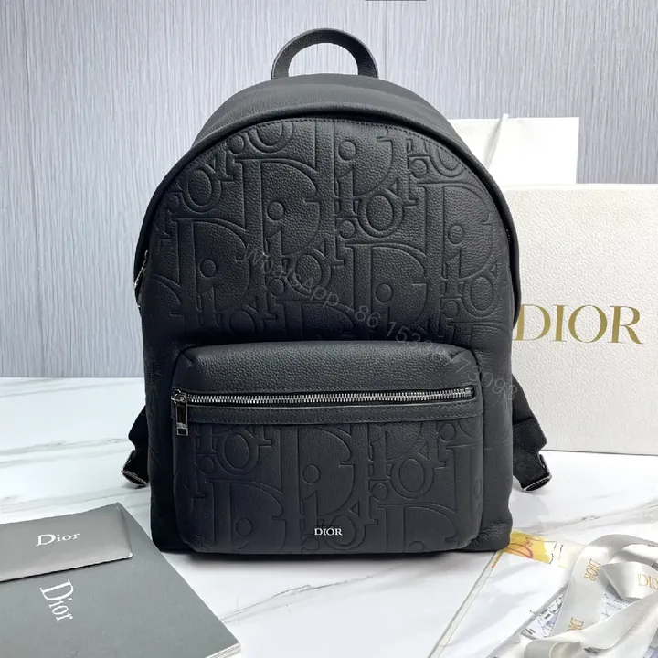View 1 of Compact Embossed Leather Backpack: Subtle Luxury, Everyday Utility