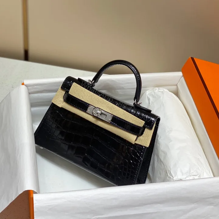 View 1 of HERMES MINI KELLY IN BLACK CROCODILE SKIN SILVER HARDWARE