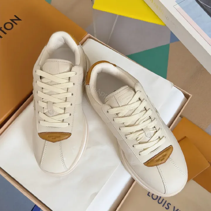 View 1 of Off-White Leather Sneakers: Premium Tan-Accented Everyday Comfort