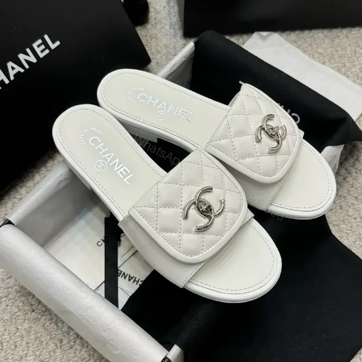 View 1 of Quilted White Leather Slides with Logo Detail, Open-Toe Slide, Luxury Comfort