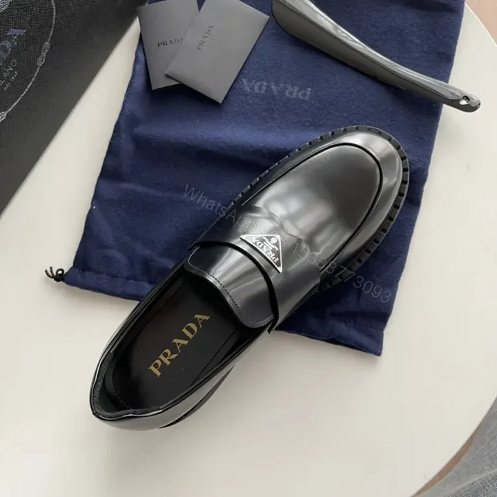 View 1 of Glossy Prada Penny Loafer: All-Day Confidence in Patent Leather