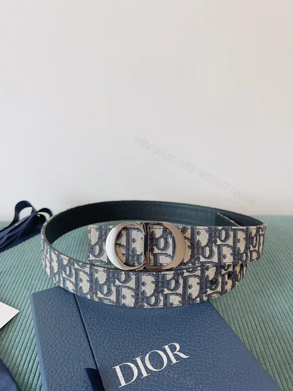 View 1 of Navy Dior Oblique Belt: Jacquard Texture & Silver Buckle