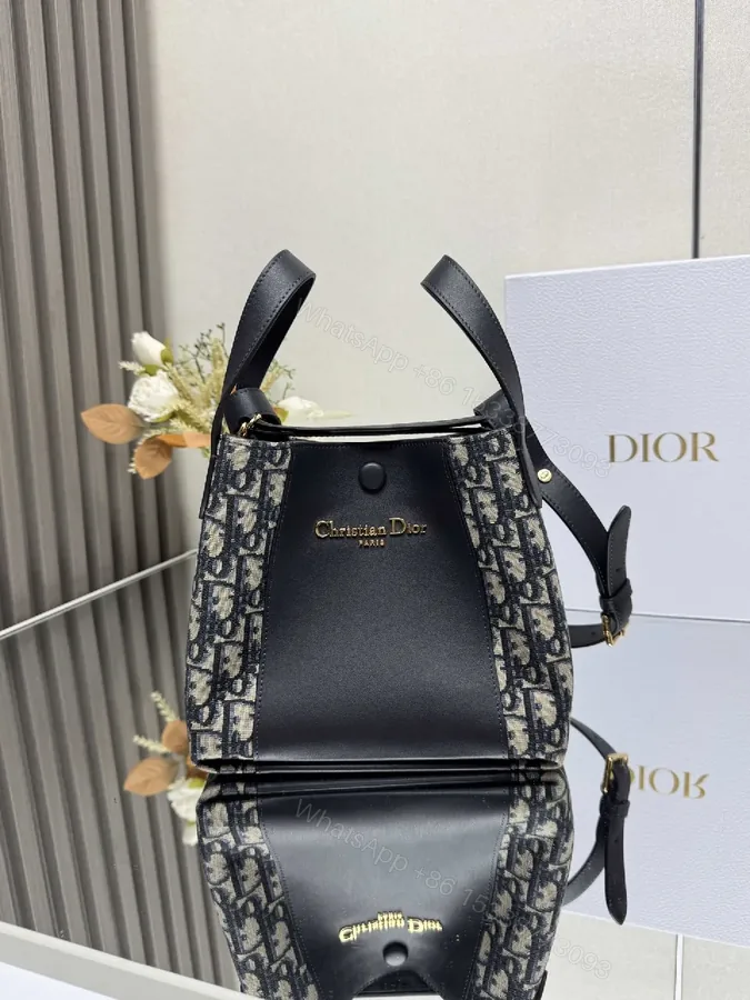 View 1 of Structured Black Leather Monogram Mini Bag with Gold Hardware