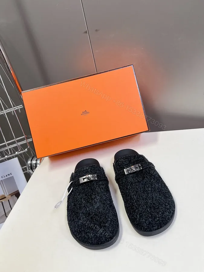 View 1 of Hermes Women Black Fuzzy Fabric Mules