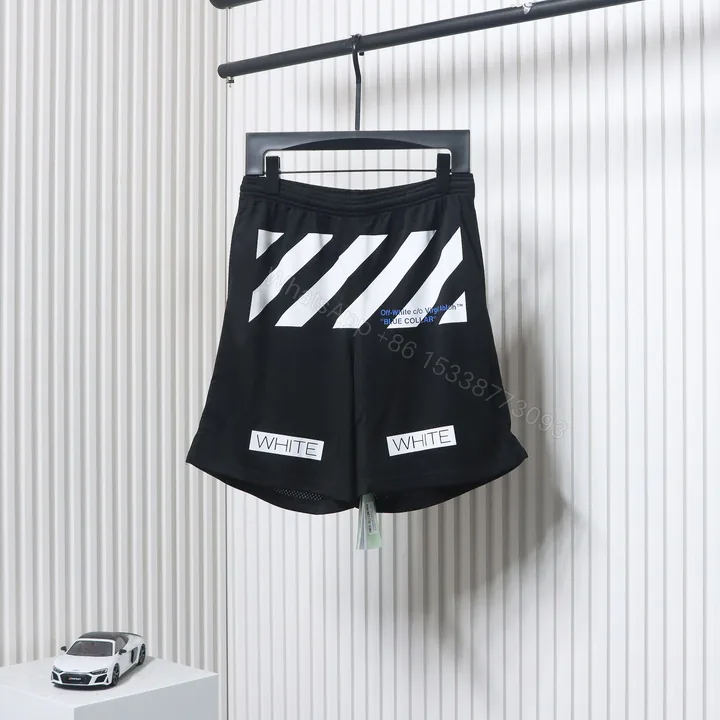View 1 of Off-White Front Printed Mesh Shorts