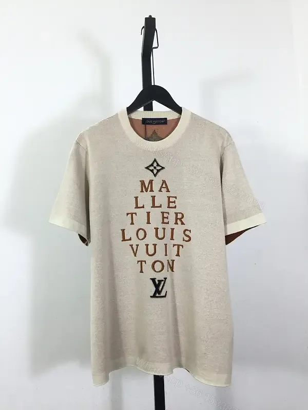 View 1 of Beige cotton T-shirt with monogram print, luxury designer-inspired tee for everyday luxury