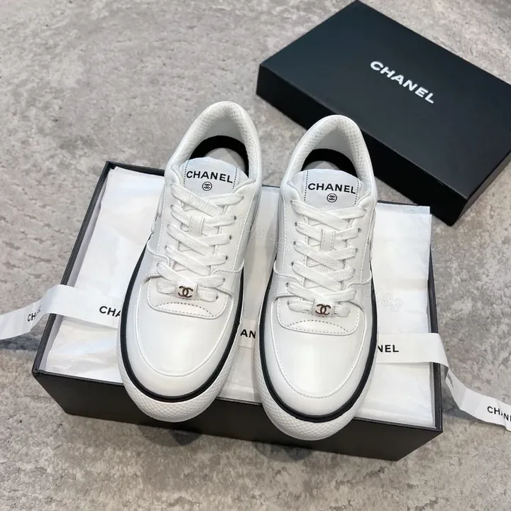View 1 of Chanel-Inspired White Leather Sneakers with Hardware