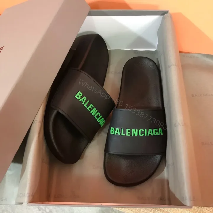 View 1 of Bold Neon Logo Slides: Black Comfort, Statement Style
