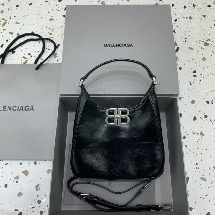 View 1 of Chic Black Leather Mini Bag with Double-B Clasp