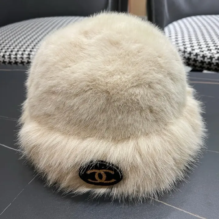 View 1 of Cream Faux Fur Pom Hat: Lux Soft Warmth, Subtle Logo Accent