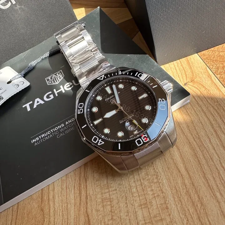 View 1 of TAG Heuer Aquaracer Nightdiver Automatic Watch 43MM DLC Black Ceramic Bezel Stainless Steel Bracelet Premium Edition TAG-AQUA-ND-43