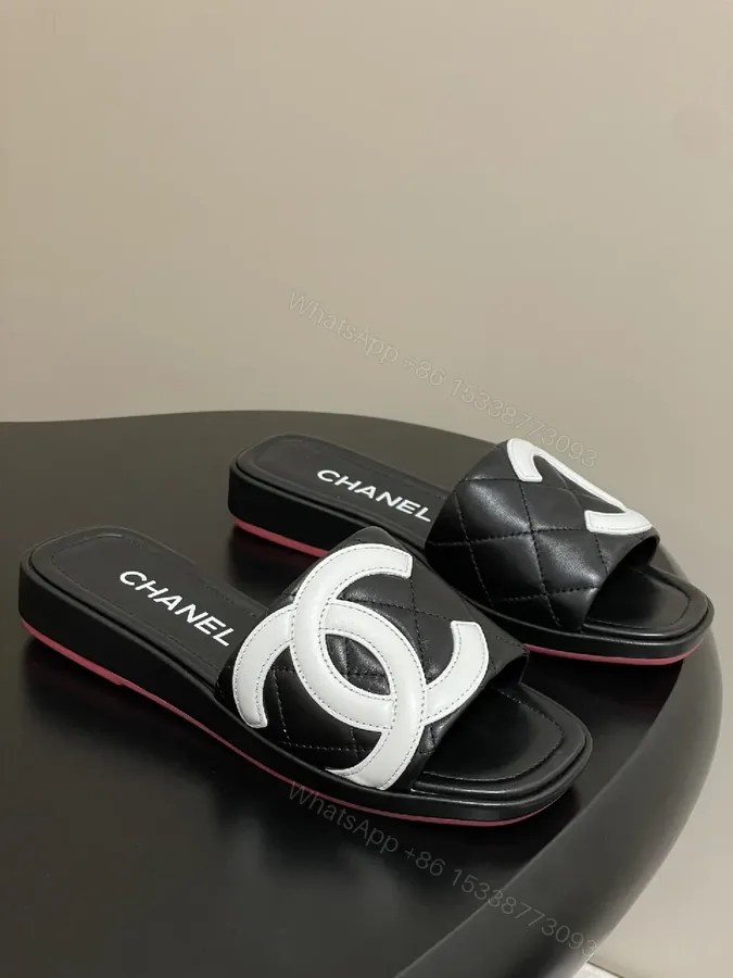 View 1 of Quilted Black Slides with Bold Logo Straps - Luxury Casual