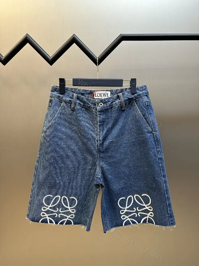 View 1 of Denim Shorts: White Embroidered Logo, Relaxed Fit, Luxe Style