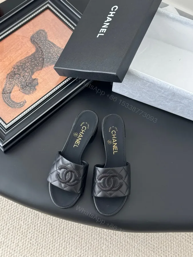 View 1 of Chanel Women Black Quilted Leather Slides