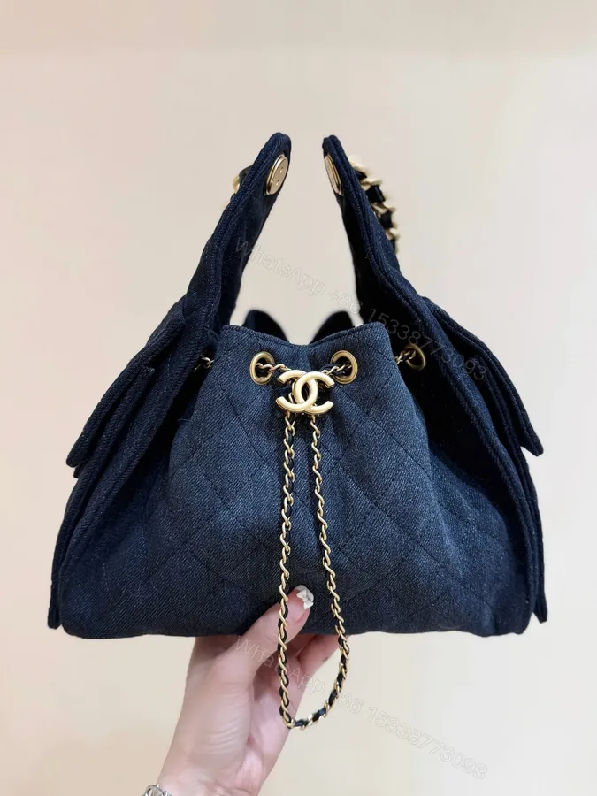 View 1 of CHANEL 25 HANDBAG 30 IN DENIM GOLD HARDWARE