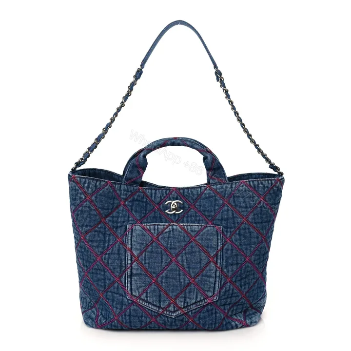 View 1 of Chanel Denim Stitched Coco Beach Tote XB96452