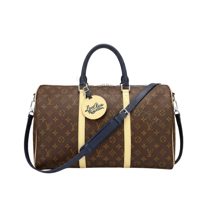 View 1 of Louis Vuitton Keepall Bandoulière 50 Monogram Canvas Light Yellow 45cm