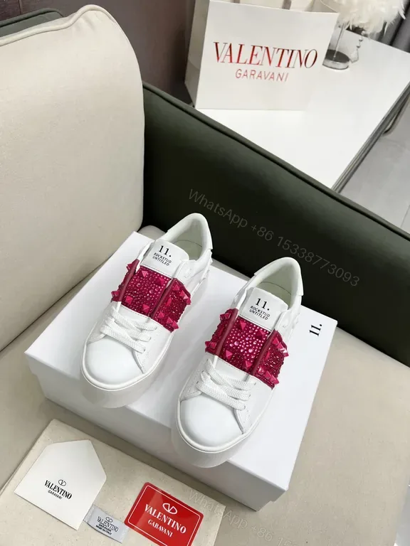 View 1 of Bold White Leather Sneaker Pink Strap Luxe Comfort Sneakers
