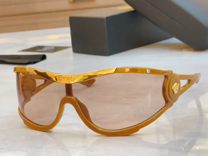 View 1 of Amber Frame Futuristic Sunglasses — Luxury UV Protection, Durable, Comfortable
