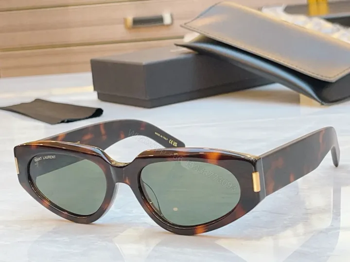 View 1 of Tortoiseshell Cat-Eye Sunglasses with Gold Hardware, UV400 Lens