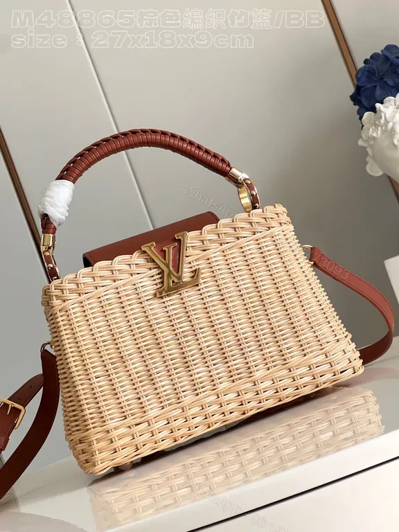 View 1 of Chic Straw Handbag with Leather Trim and LV Emblem