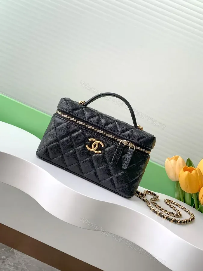 View 1 of Quilted Black Bag with Gold Hardware - Chic Compact Style