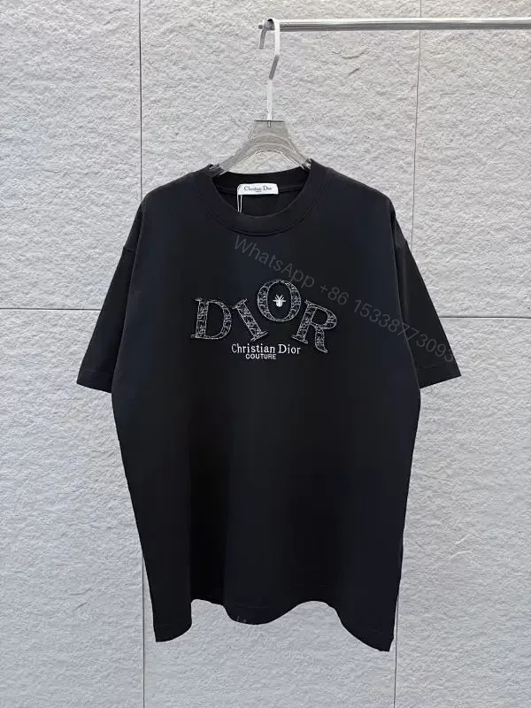 View 1 of Bold Luxe Monogram Tee: Black, Oversized Fit, Graphic Statement