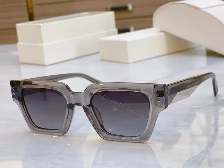 View 1 of Bold Shield Sunglasses with Translucent Gray Frame Difference