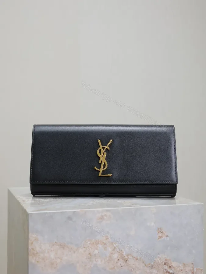 View 1 of Elegant Leather Clutch: Black, Gold Hardware, Minimalist Luxe